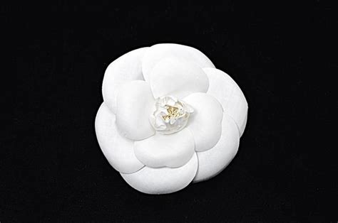 chanel box flower|Chanel white flower brooch.